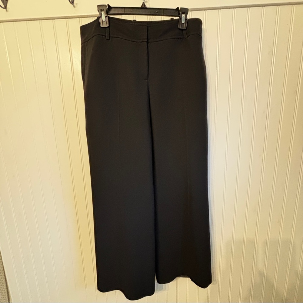 Ann Taylor Signature Fit just below the waist 
Black Wide-Leg Pants